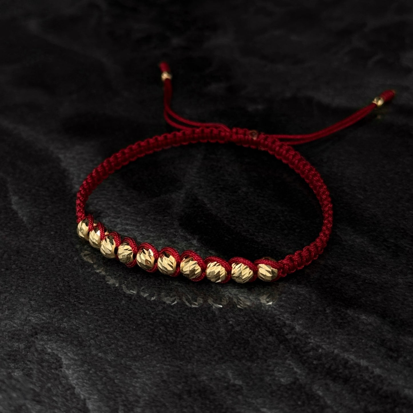 Pulsera Tejida / Balines Oro 18K