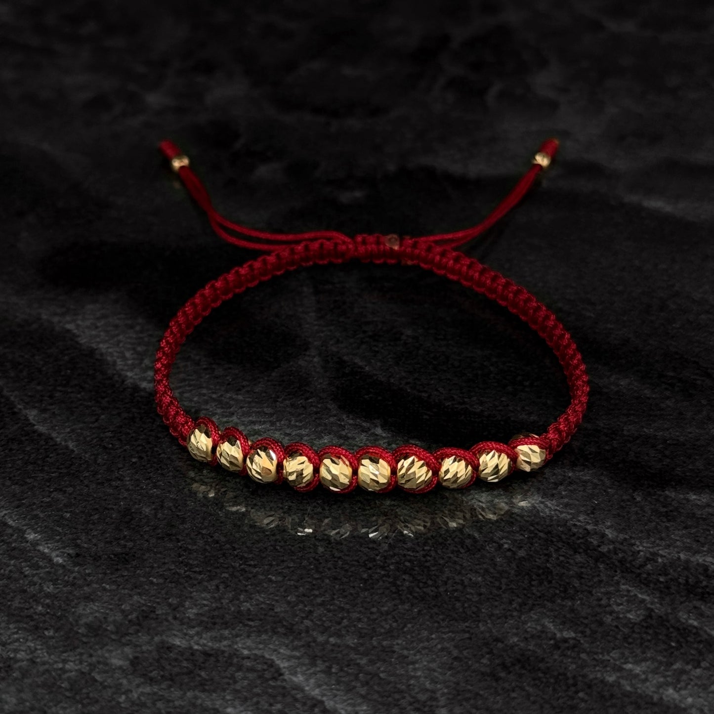Pulsera Tejida / Balines Oro 18K