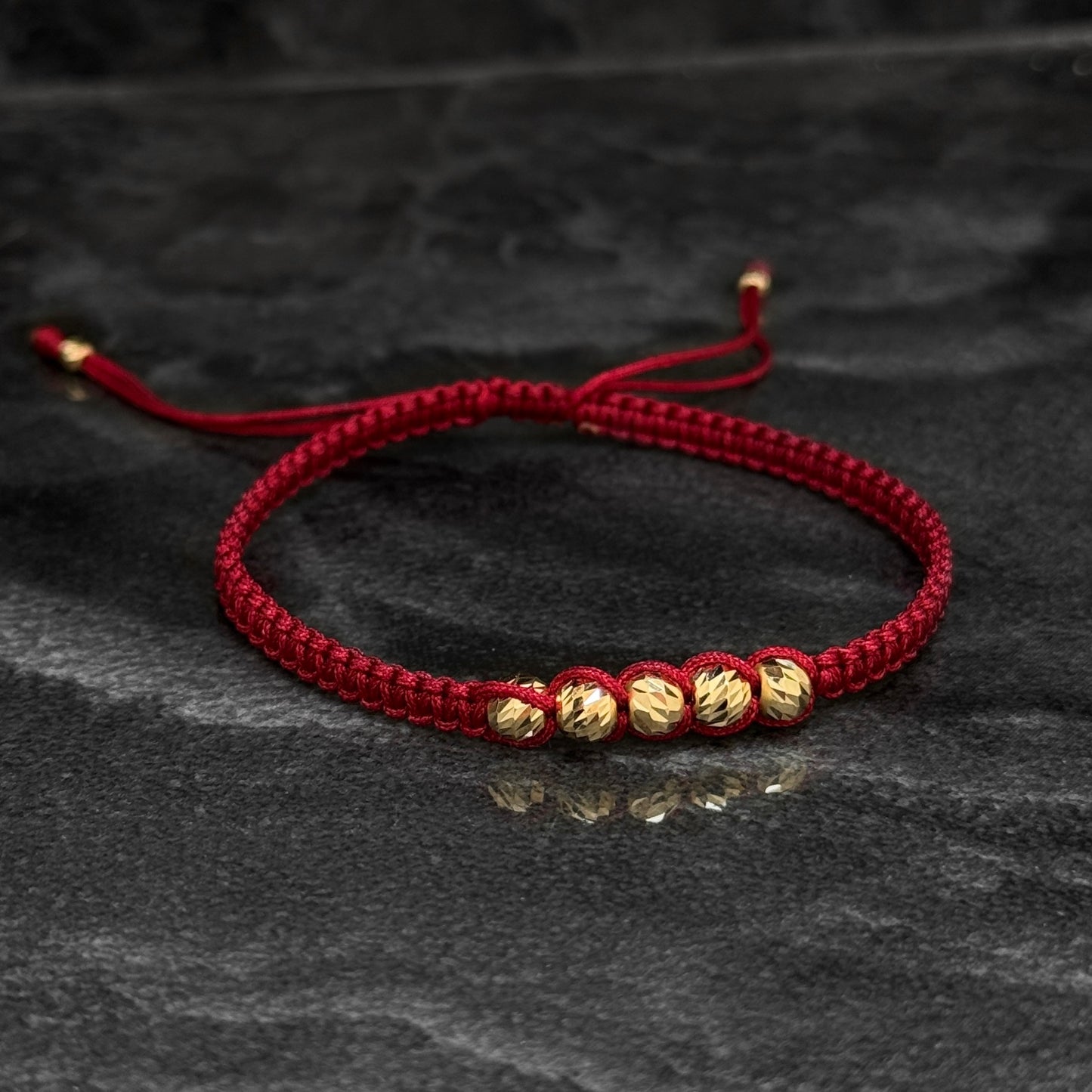 Pulsera Tejida / Balines Oro 18K