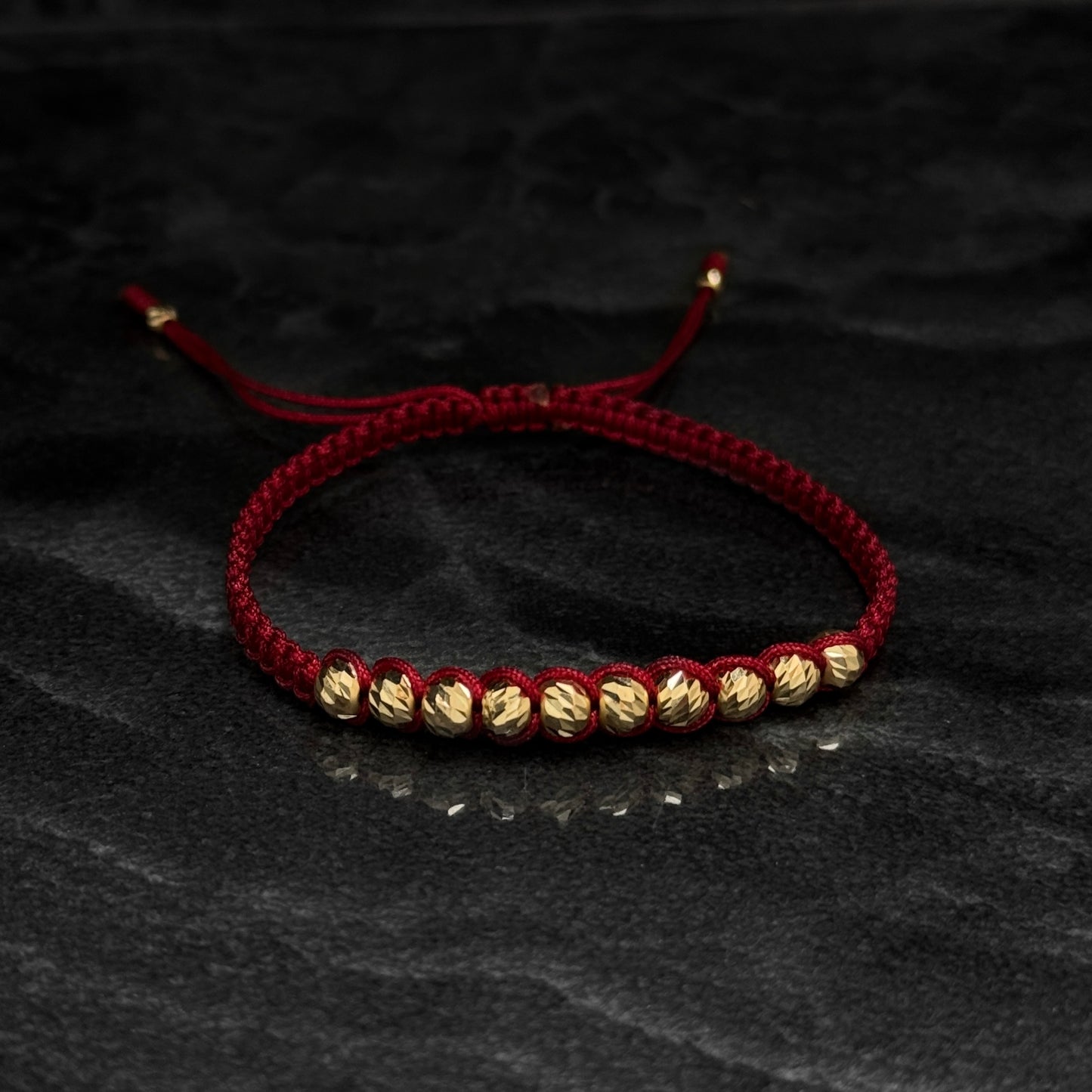 Pulsera Tejida / Balines Oro 18K