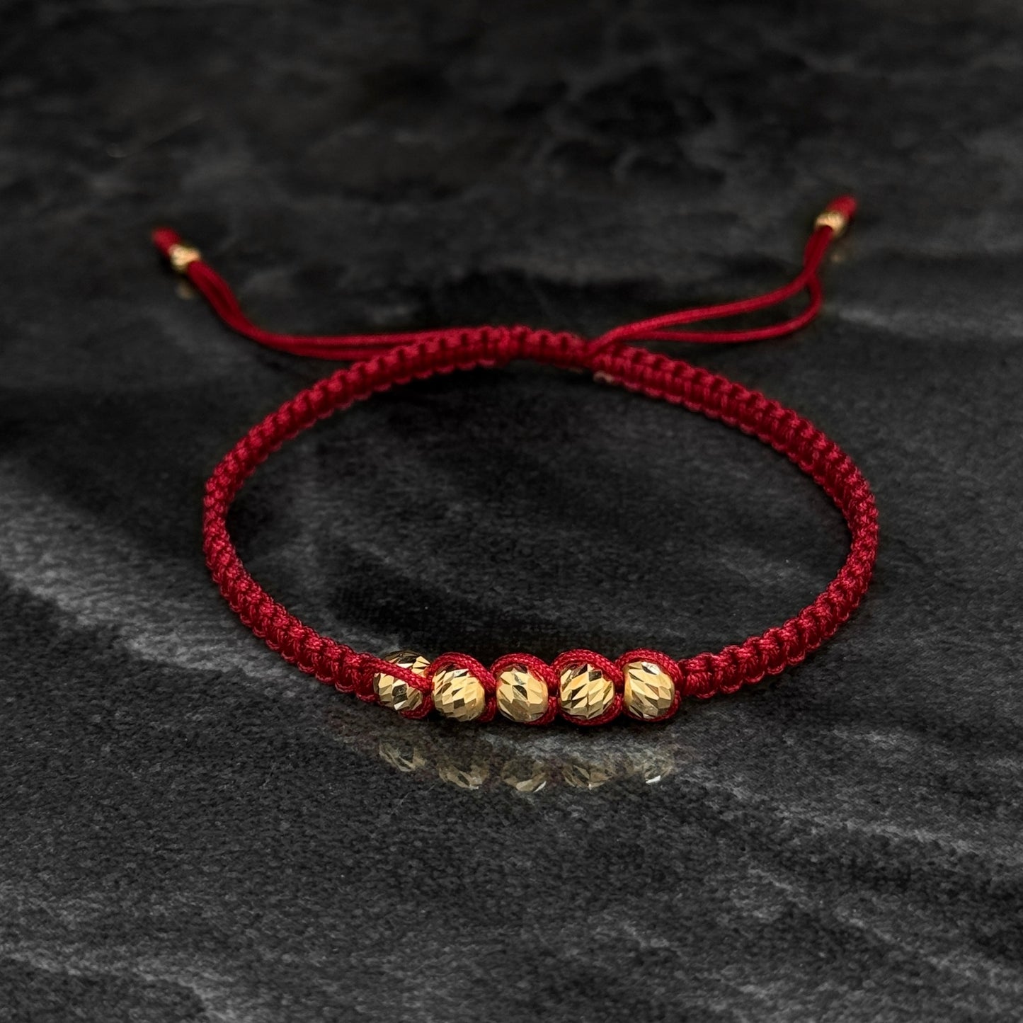 Pulsera Tejida / Balines Oro 18K