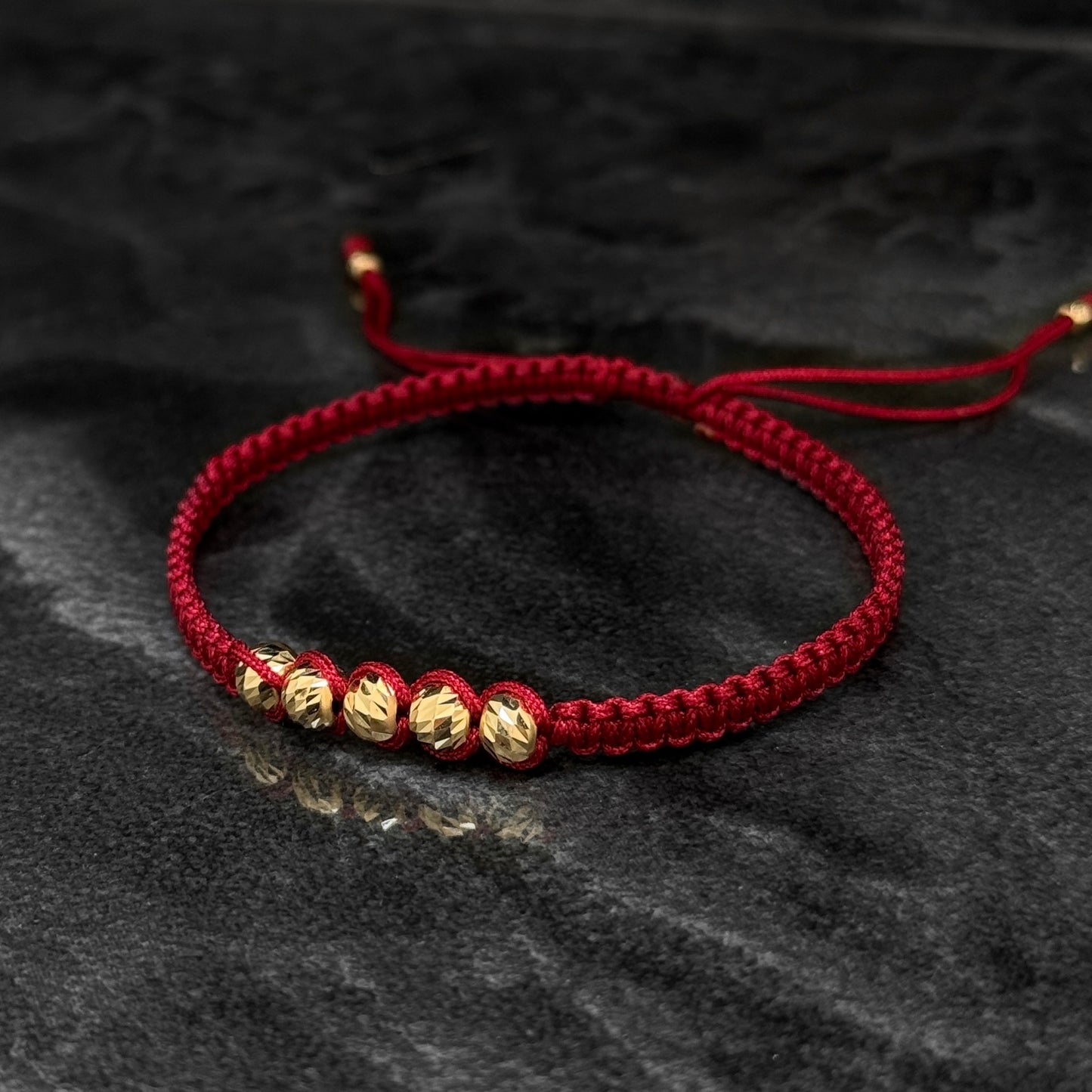 Pulsera Tejida / Balines Oro 18K