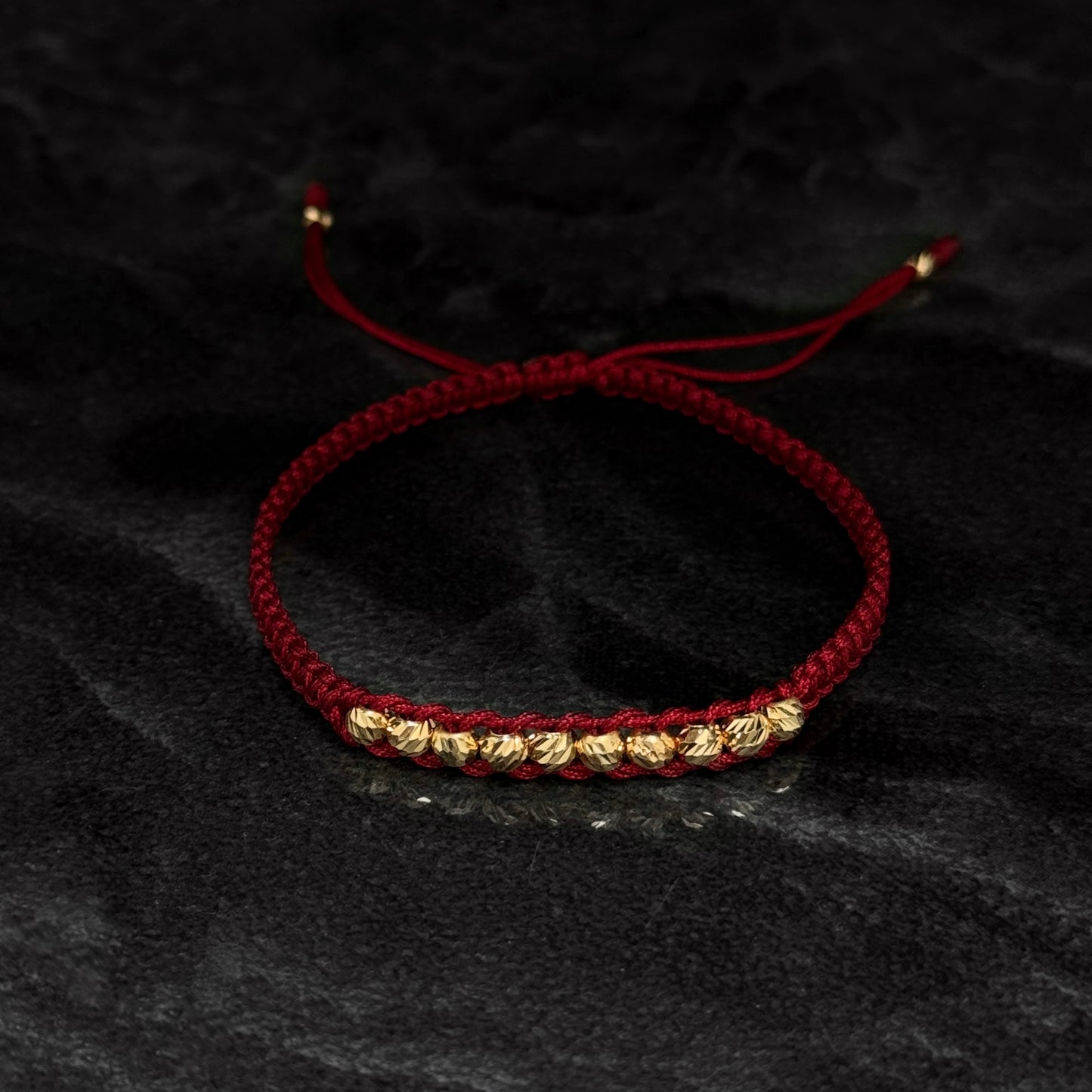 Pulsera Tejida / Balines Oro 18K