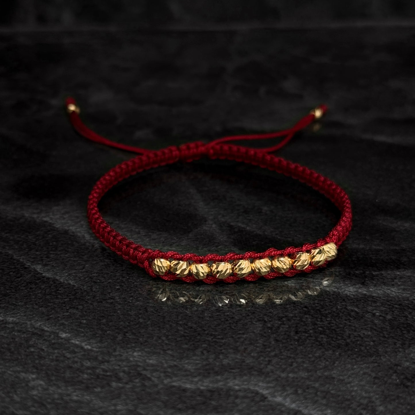 Pulsera Tejida / Balines Oro 18K