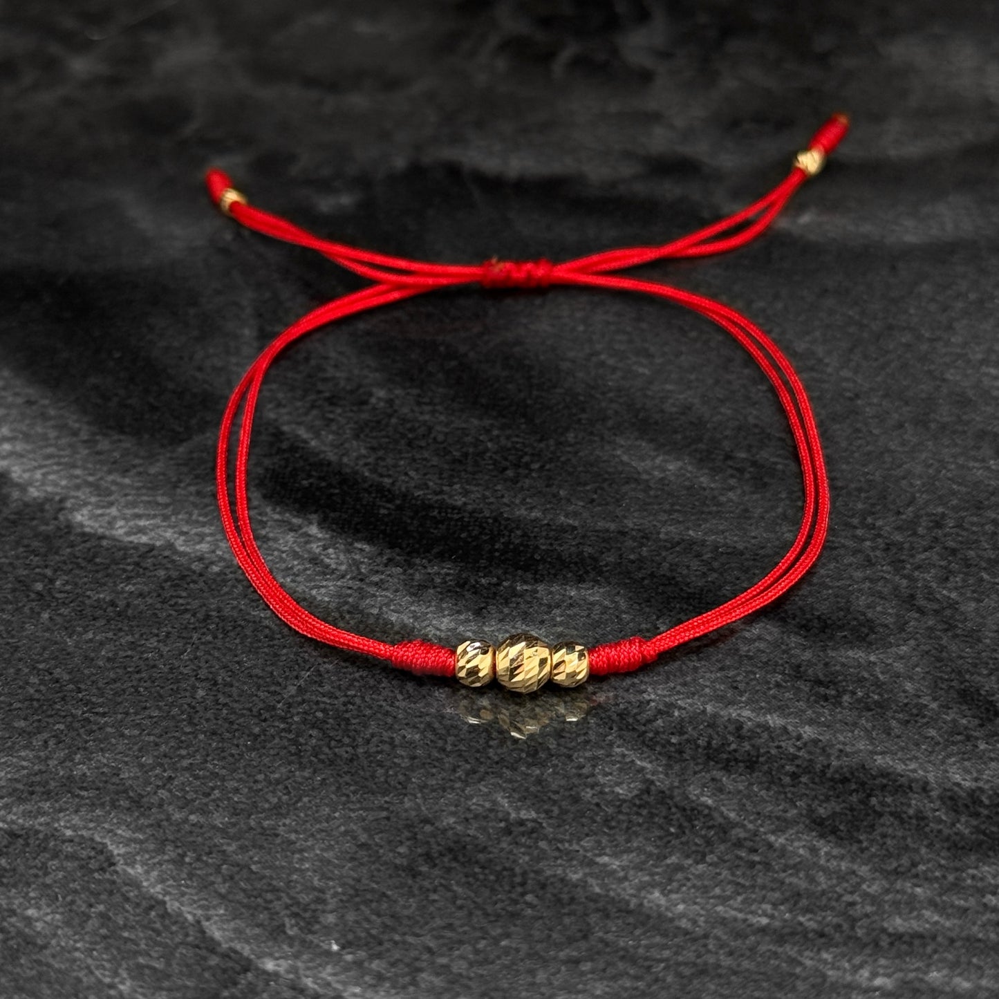 Dúo Pulseras Tejidas / Balines Oro 18K