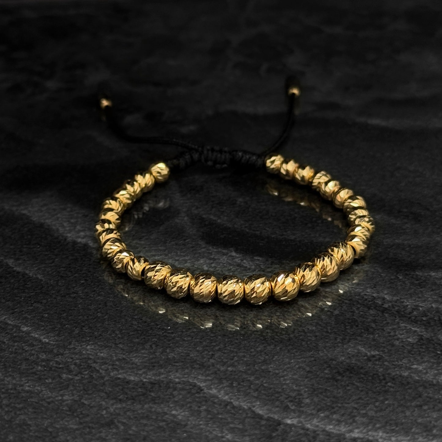 Pulsera Tejida de Lujo / Balines Oro 18K