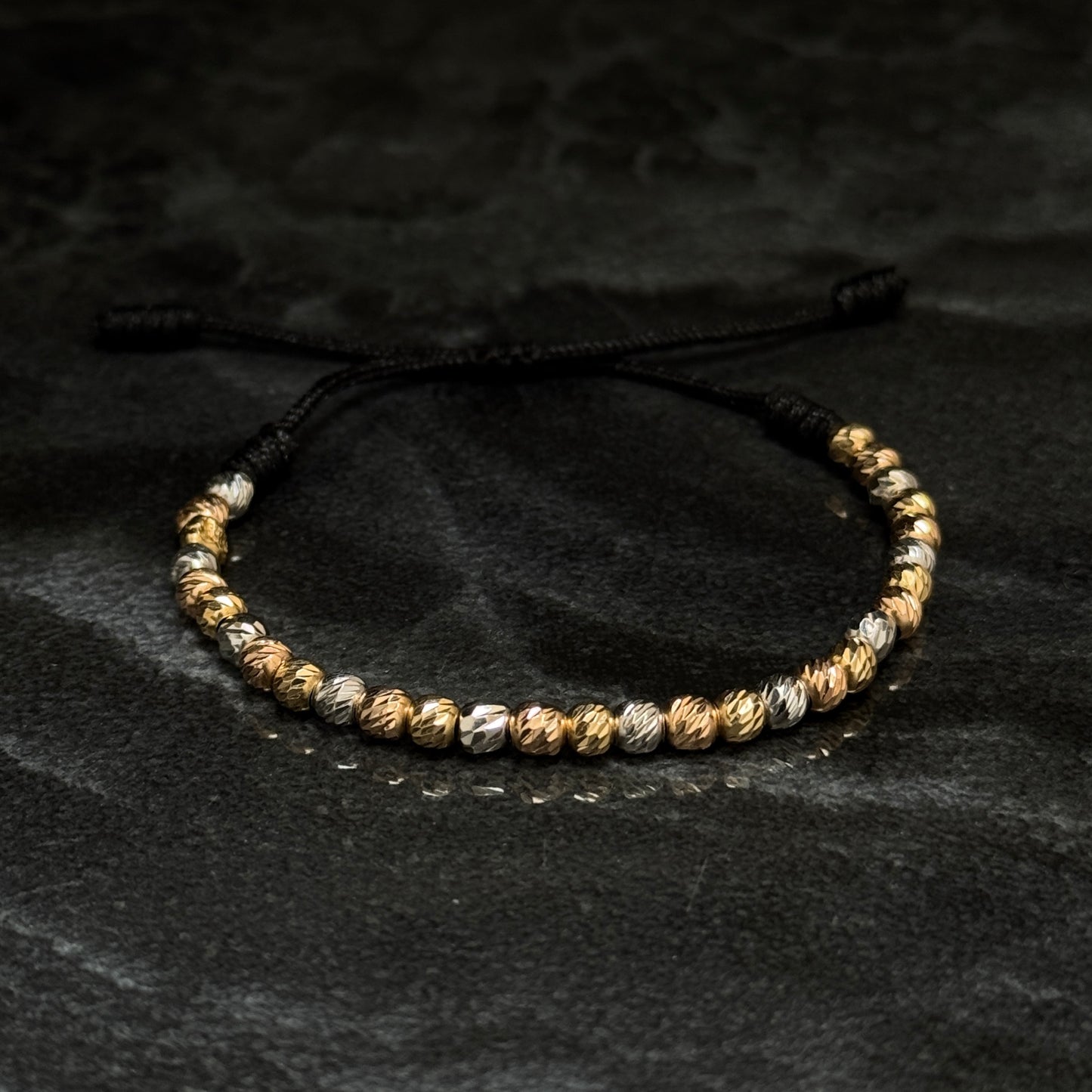 Pulsera Tejida de Lujo / Balines Oro 18K